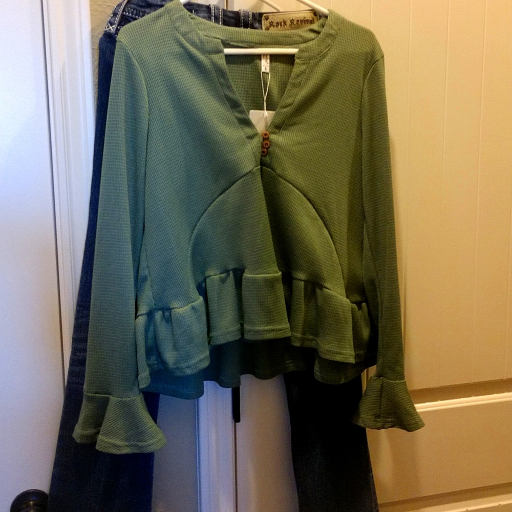 Green beautiful blouse with bottom sleeves that flare